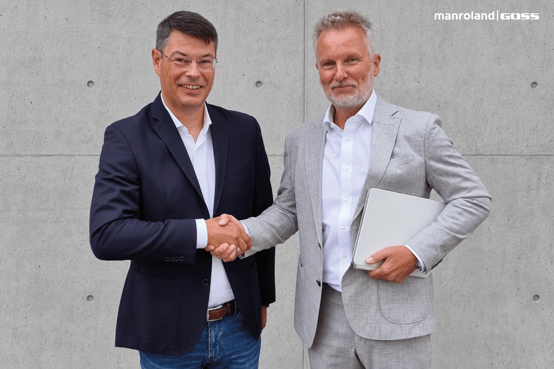 Joachim Brenk, Chairman of the Possehl Group (right) andFranz Kriechbaum, CEO of the manroland Goss Group